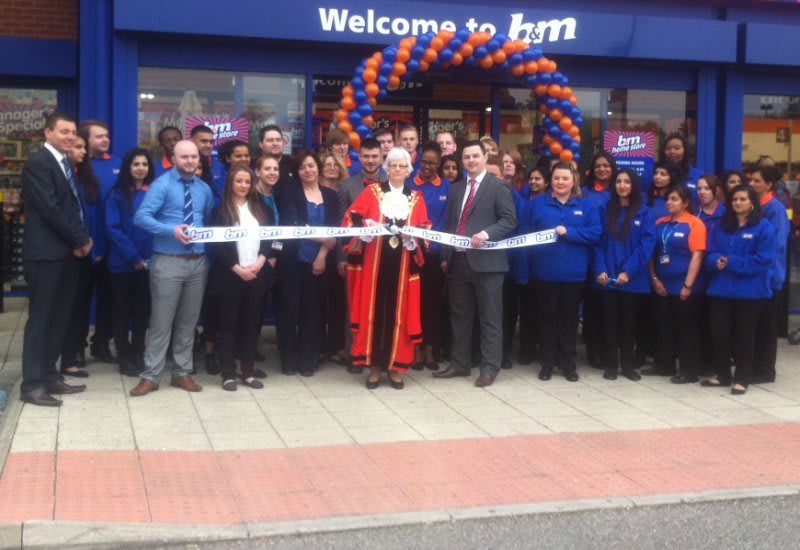 Store manager Ben Gough is joined by Mayor of Hillingdon Catherine Dann who cut the ribbon with local charity Micheal Sobell Hospice.