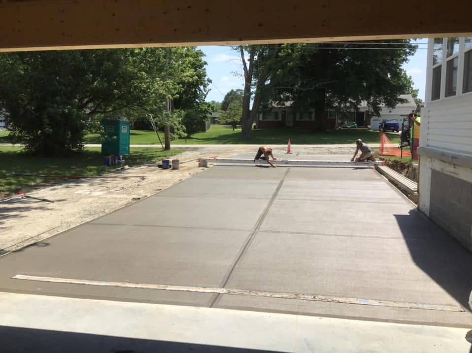 When you're a contractor, you end up doing all types of construction tasks. That includes installing new concrete driveways. We poured this driveway a few years ago for a home in Fairfax. We added a broom finish to the surface for traction. It's just one of the things we can do when we help our customers. Do you have a home project in mind? Call us today and let's discuss it.