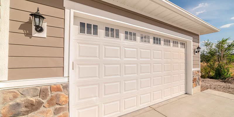 LET US INSTALL A NEW GARAGE DOOR AT YOUR HOME OR BUSINESS.