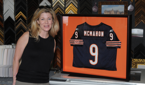 Happy Customer Donna Jacobs next to her Jim McMahon Jersey Terry's Custom Framing and Art Gallery Conway (843)248-3541