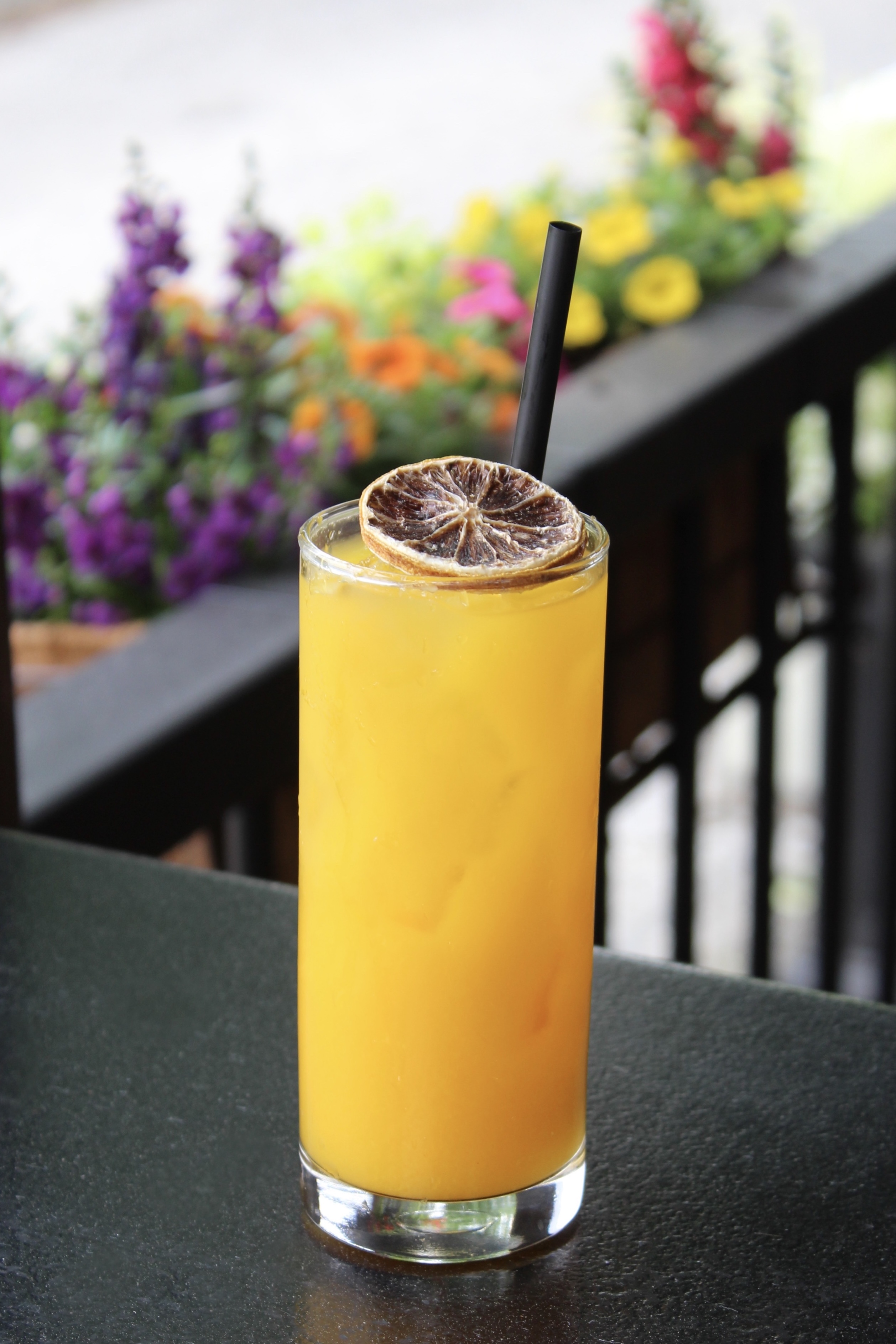 Mama's On The Half Shell Mango Tango signature drink 