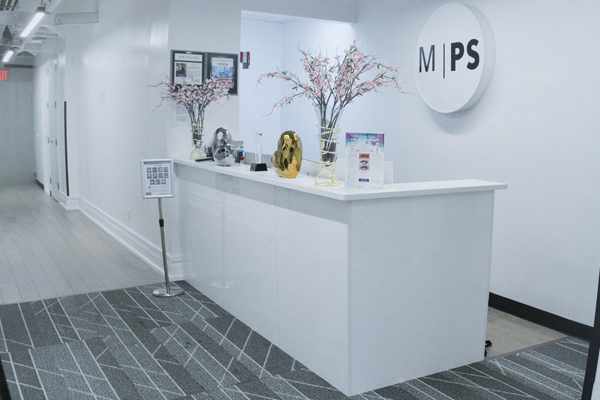Front desk and hall at the Millennial Plastic Surgery