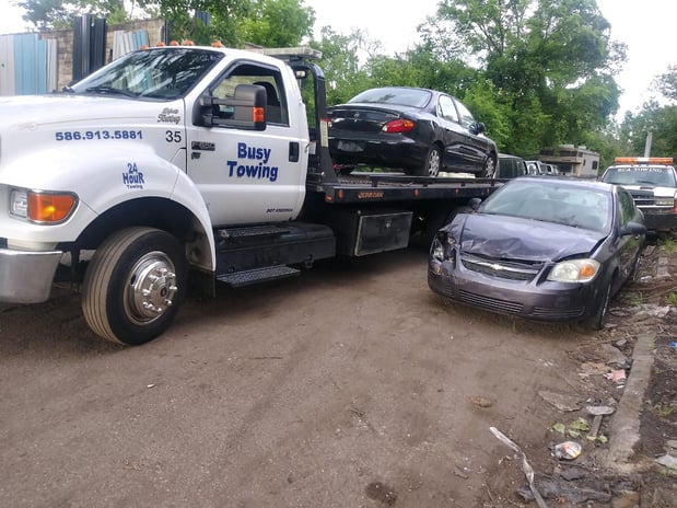 Images Busy Towing LLC
