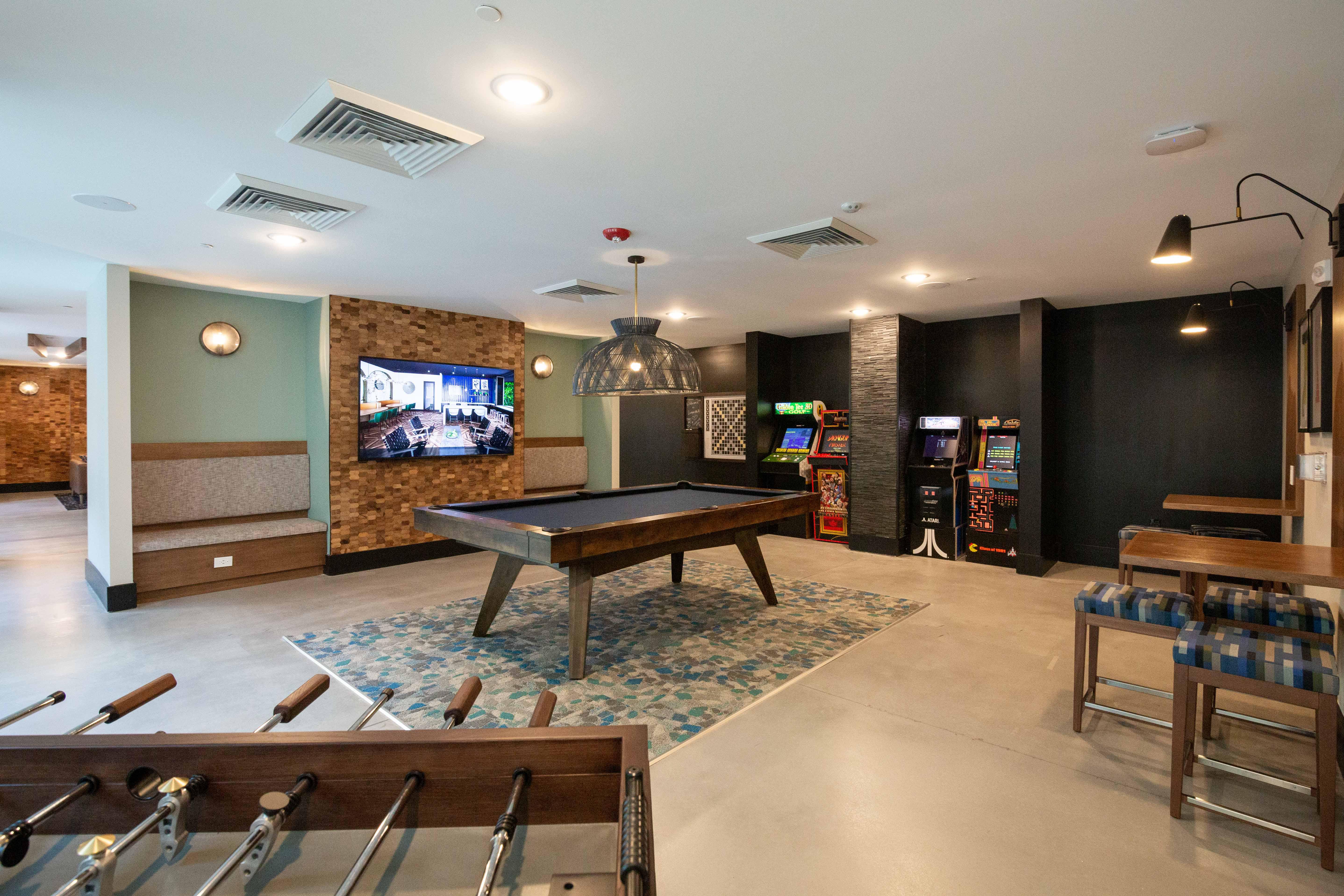 Arcade, entertainment kitchen, and streaming lounge