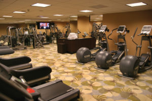 Pacific Palm Resort Gym with a variety of gym equipment.