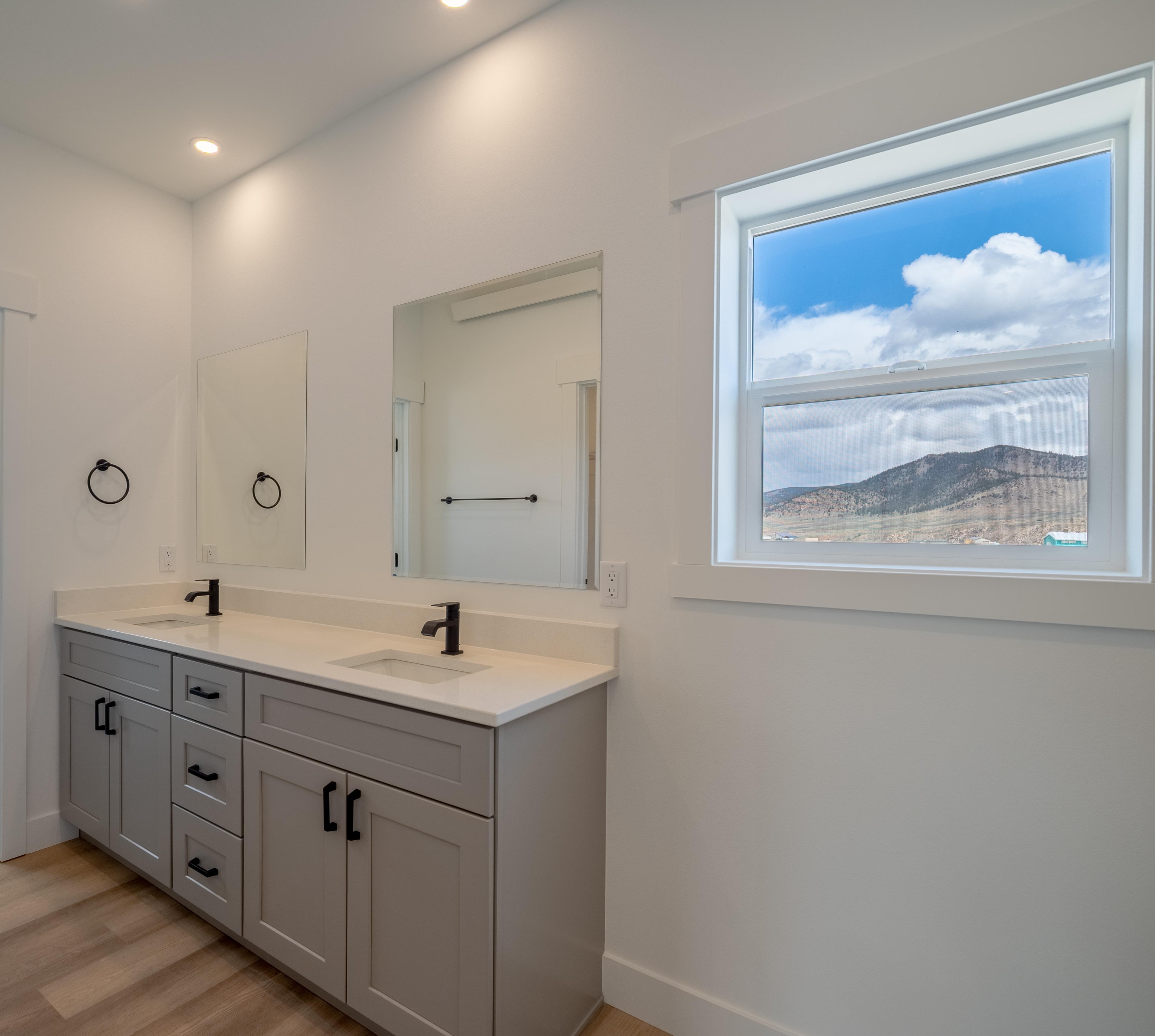 Finished Interior of a Modular Home Bathroom with Mountain views