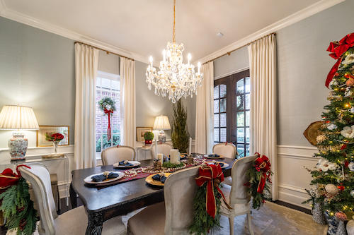 We are obsessed with this dining room! The white drapery blends seamlessly with the decor, effortlessly adding a more expansive feel to the space. With such a beautiful ambiance, Christmas dinner is destined to be perfect with family in Cocoa Beach.