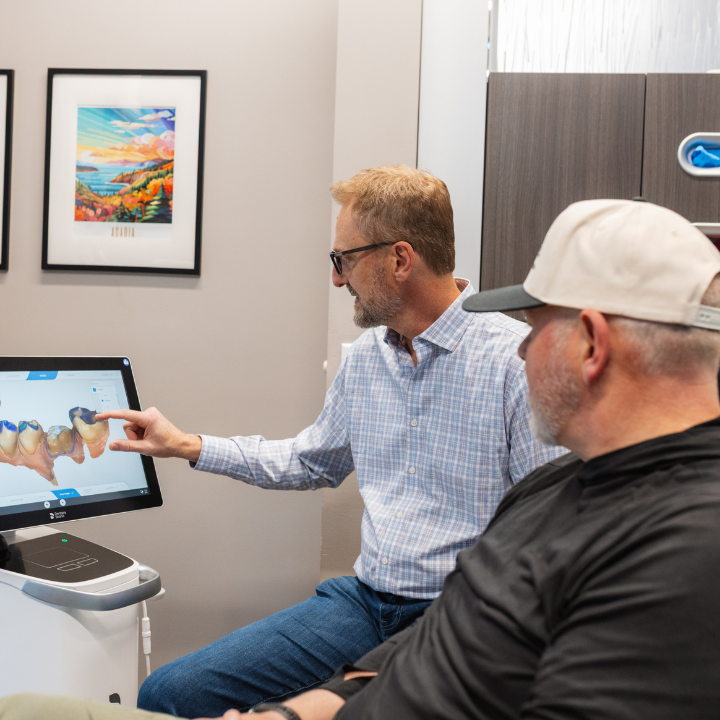 Dr. Dan Holmes brings a patient-first approach to every appointment, taking time to walk patients through their treatment options using the latest dental technology for clear, confident decision-making.