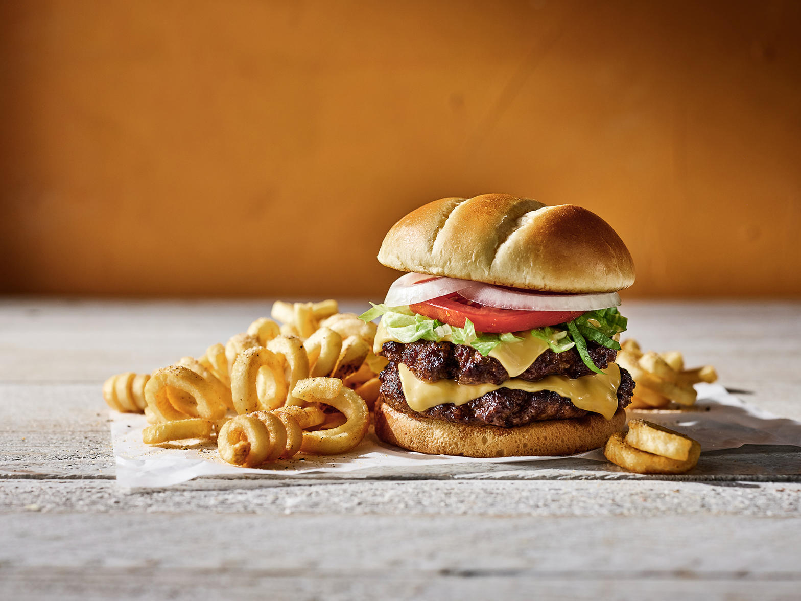 Hooters Build Your Own Burger and Curly Fries.