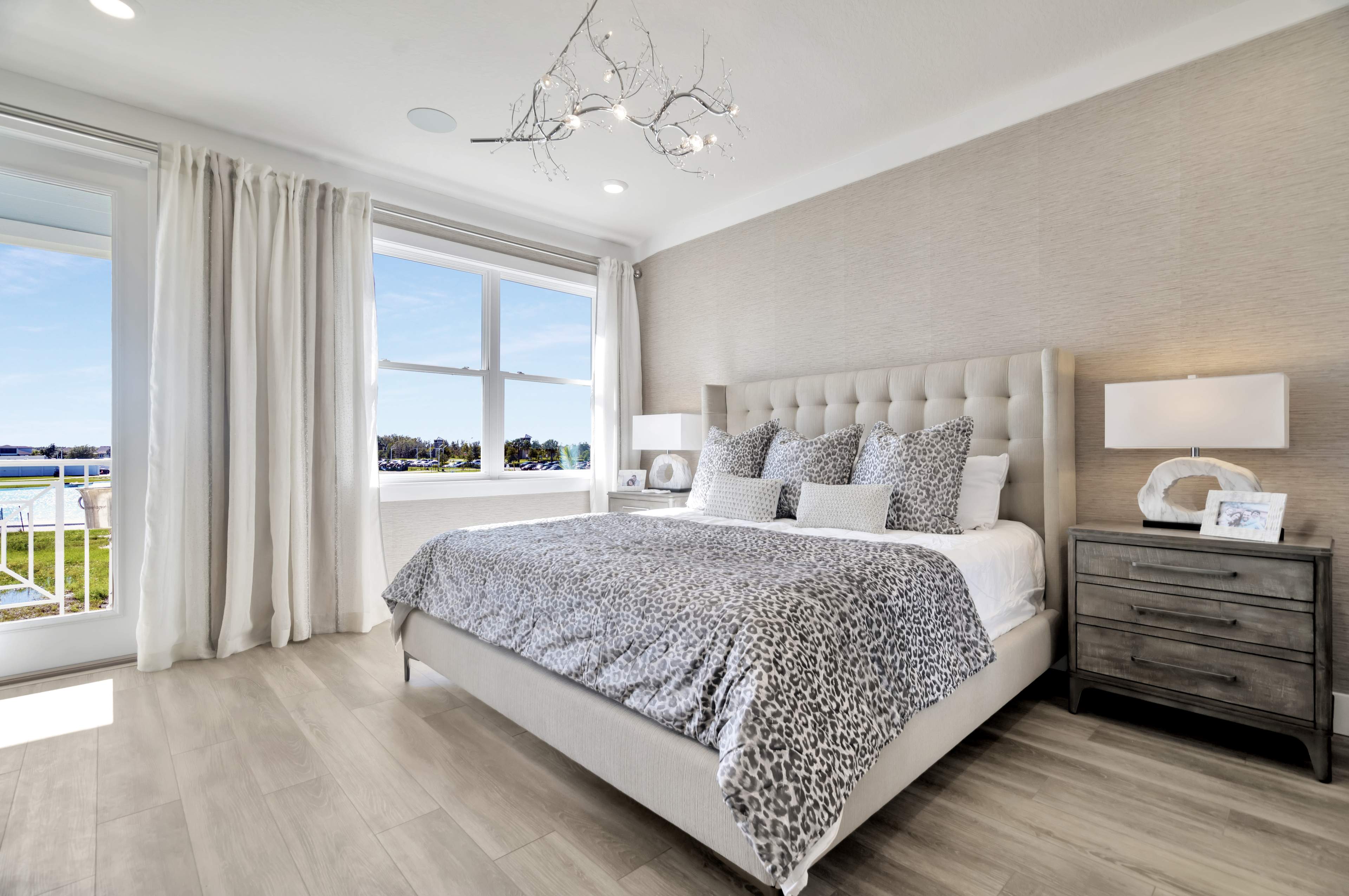 The Primary Bedroom of a DRB Homes Abaco Model at Lagoon Residences at Epperson in Wesley Chapel, FL.