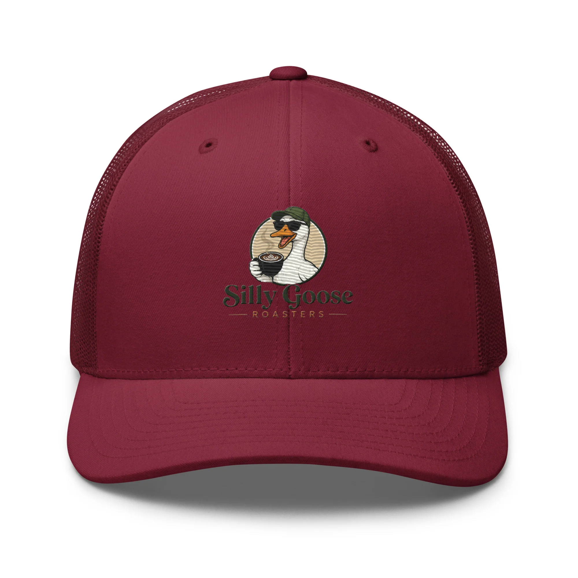 A maroon trucker hat with a mesh back, featuring a humorous embroidered logo of a goose wearing sunglasses and a cap, holding a coffee cup. Below the goose is the text "Silly Goose ROASTERS".