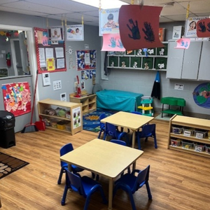 Bright and colorful preschool classroom at Childcare Network with age-appropriate learning materials