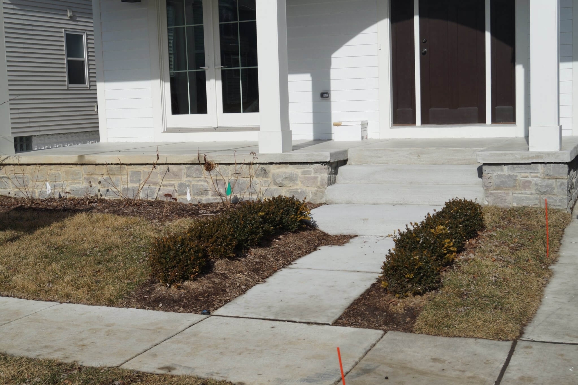 This newly installed concrete walkway by Top Hat Masonry Repair creates a clean, durable, and welcoming entrance to the home. Designed for long-term performance and curb appeal, the walkway provides a smooth, level surface that enhances both safety and visual appeal while complementing the home’s exterior.
