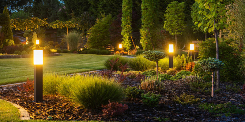 Enhance your yard with landscape lighting.