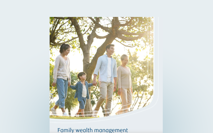 Cover of the family wealth guide with a multigenerational family.