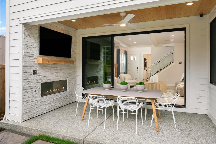 Seamless indoor-outdoor living with a cozy fireplace