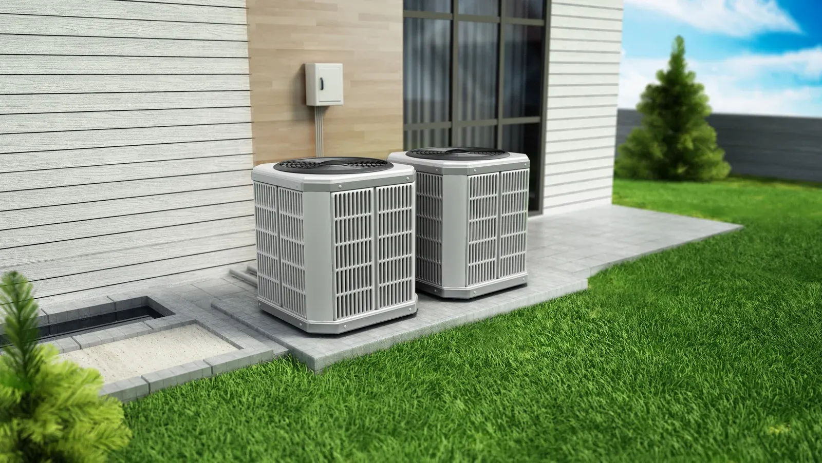 Two modern outdoor air conditioning units installed beside a house on a tiled platform, surrounded by green grass and landscaping, illustrating efficient residential HVAC system setup in a sunny environment.