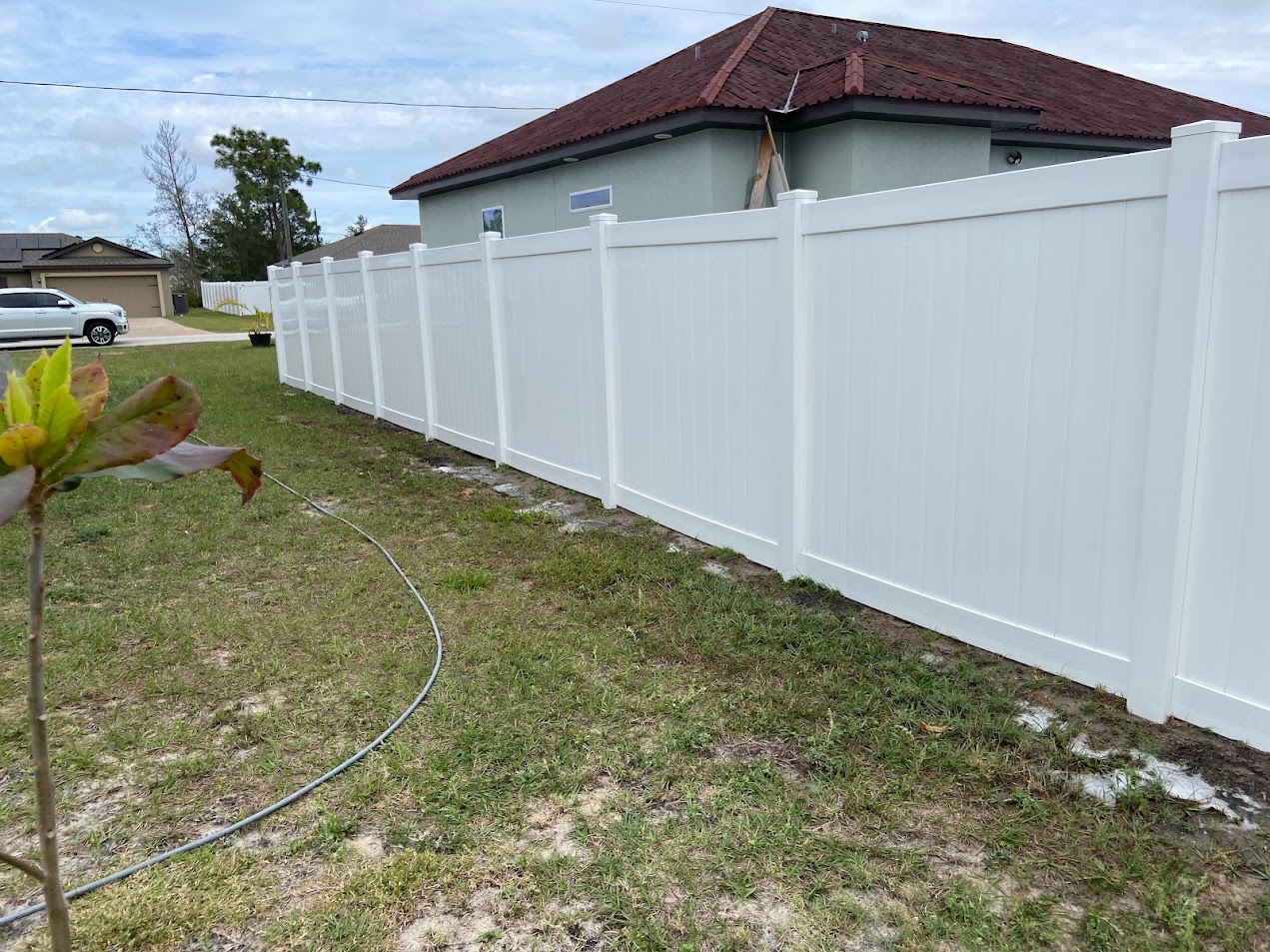 Professional vinyl fence cleaning in St. Cloud, FL removes green algae, mildew, dirt, and weather buildup to bring back a cleaner, brighter appearance