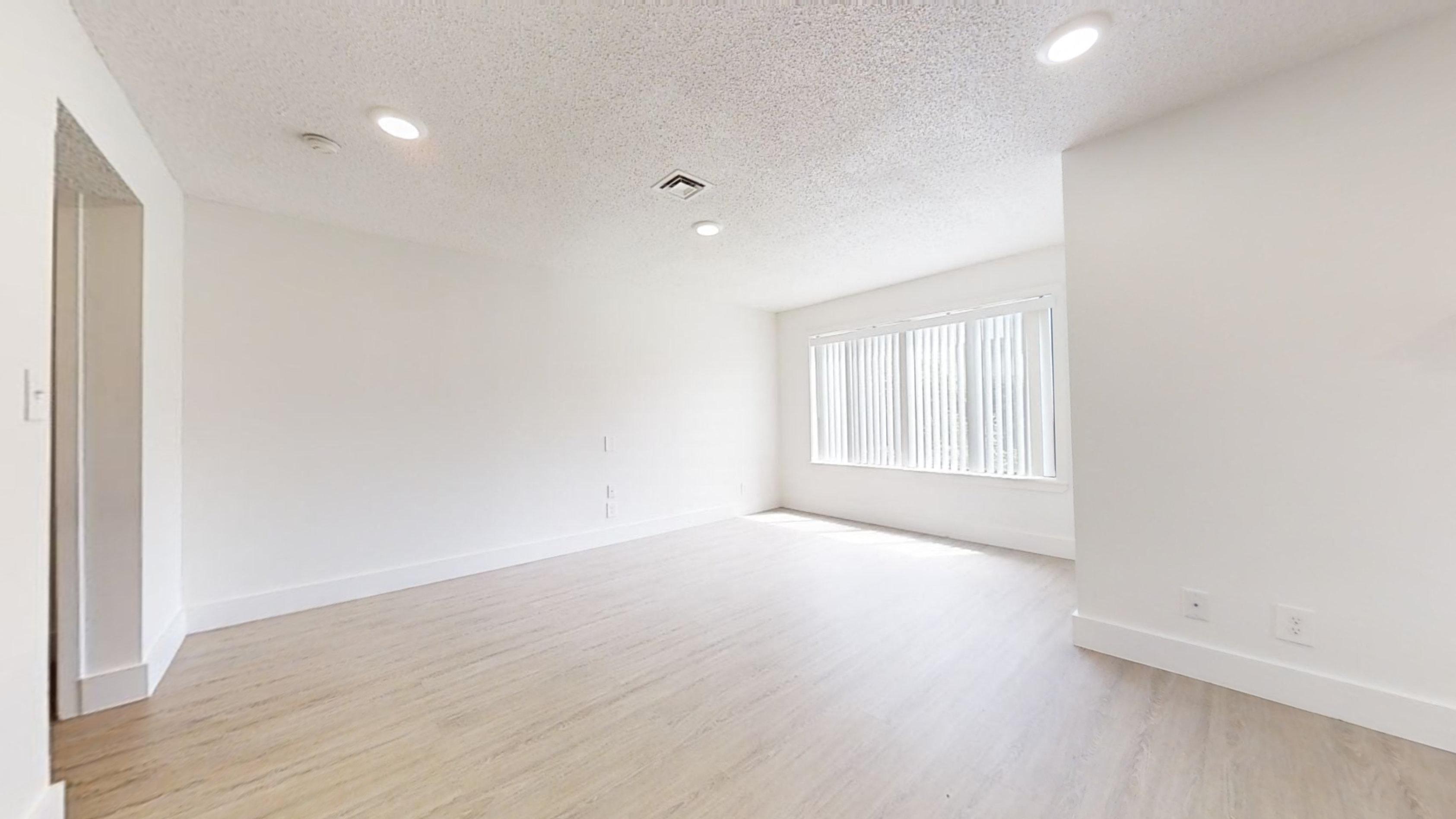 Empty Living Room at Avia Lofts at Maple Road in Amherst, NY