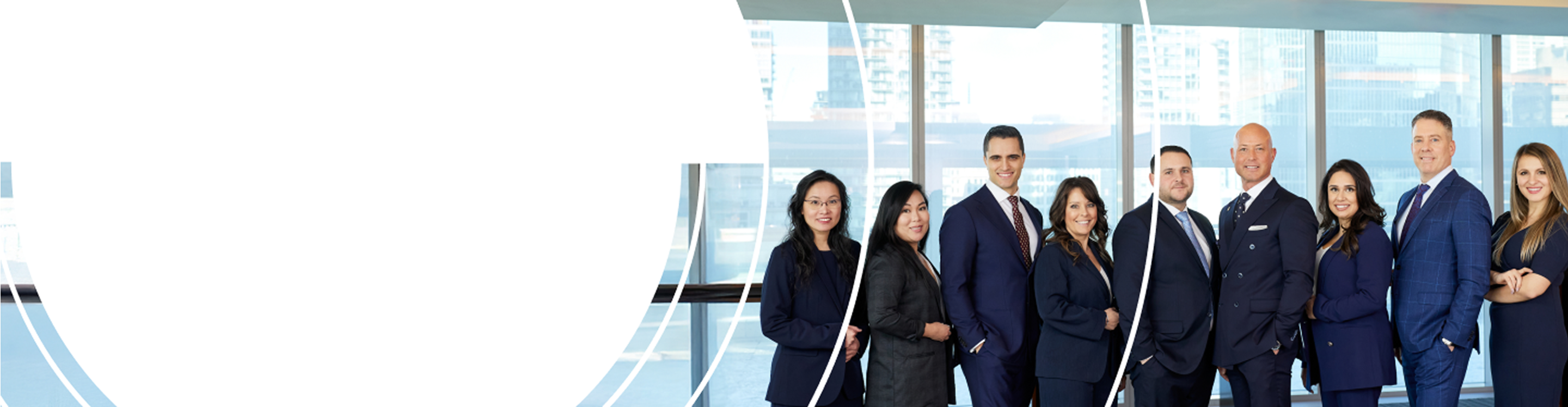 Mainella Private Wealth team standing side by side.