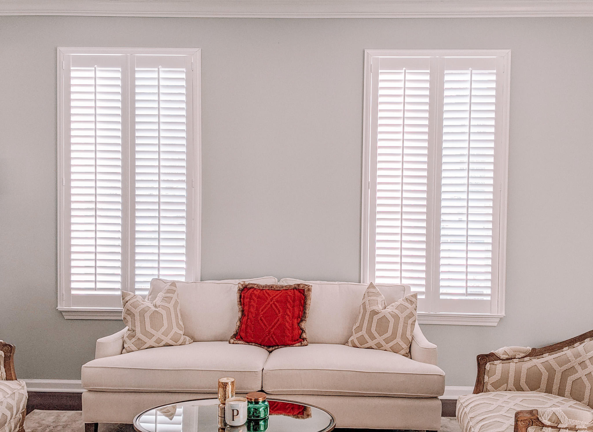 Beautiful white plantation shutters are a clean and timeless way to finish any room just like this living room in Freehold. NJ