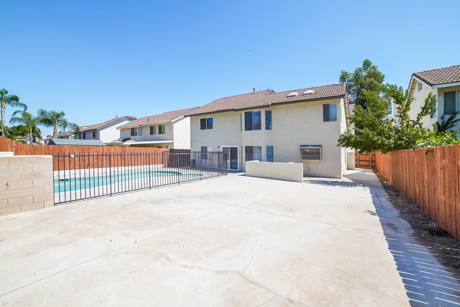 Backyard with swimming pool at Invitation Homes Southern California.