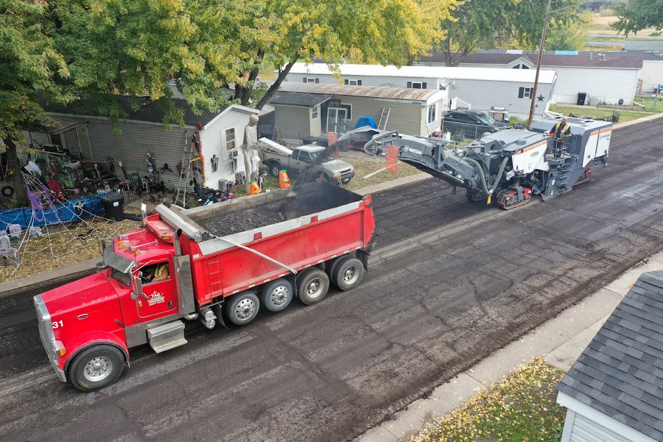 Upgrade your community with durable sidewalks, aprons, and sealcoating from the experts at TAG Asphalt & Concrete. Quality results for every neighbor.