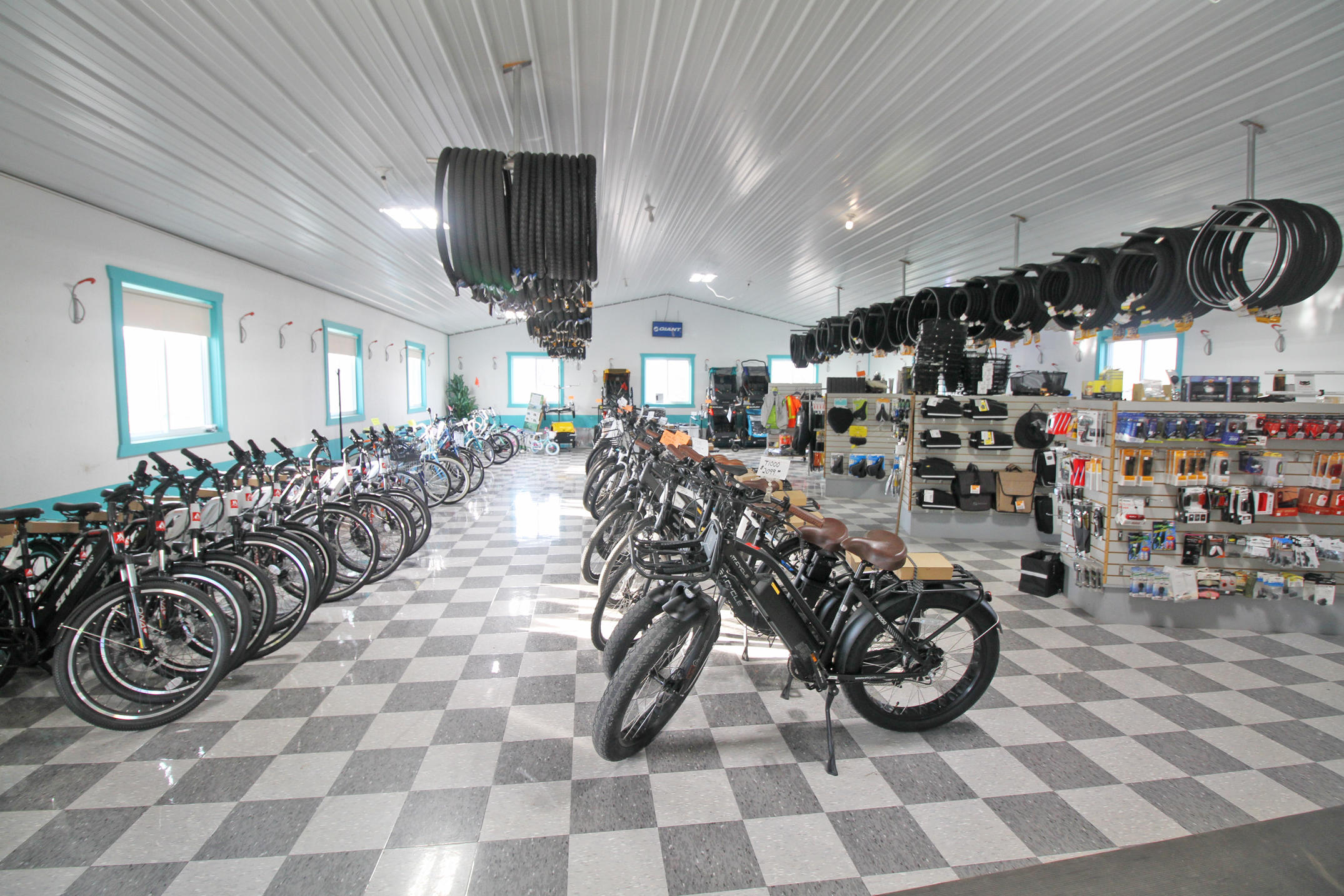 Straight answers with an extensive selection of top brands of E-Bike, conventional bikes, kids bikes, aluminum flat bars, hybrids, trailers and accessories.

Our attention to detail will give you the best riding experience. When fitting your bike, we consider all variables like rider size, riding style and stamina.

Top brands, fair pricing and service leaves a lasting impact and will have you telling your friends. Our wide variety of bikes from Giant, Velec, E-Joe, Surface, Norco, I-Zip are in stock and ready to fit you. We offer E-Bikes with double the range, so you go further with less effort and more pleasure. We also carry Burley bike trailers!