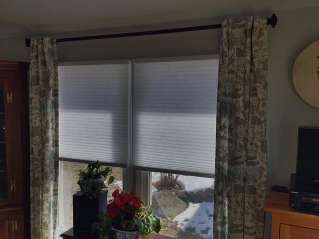 Our expert installation team is committed to bringing new life to your home. These coordinated Draperies and Honeycomb Shades look great in this Croton on Hudson, NY, home. #BudgetBlindsOssining #CrotonOnHudsonNY #HoneycombShades #CustomInspiredDraperies #FreeConsultation