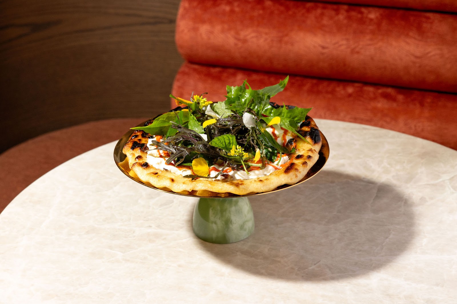 A savory starter from the Markette kitchen, plated for the table. Served in the dining room in Chelsea, Manhattan.