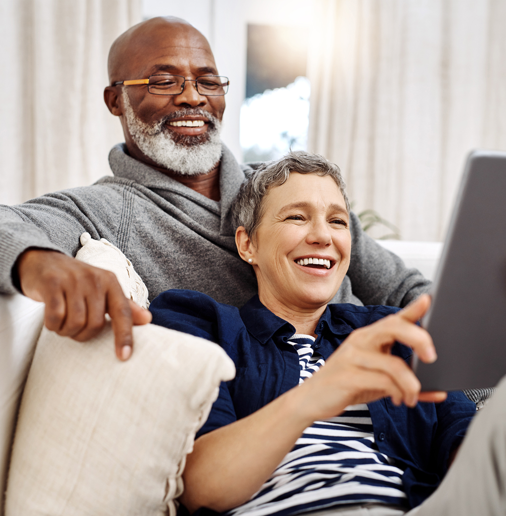 A couple sharing a moment together on the couch.