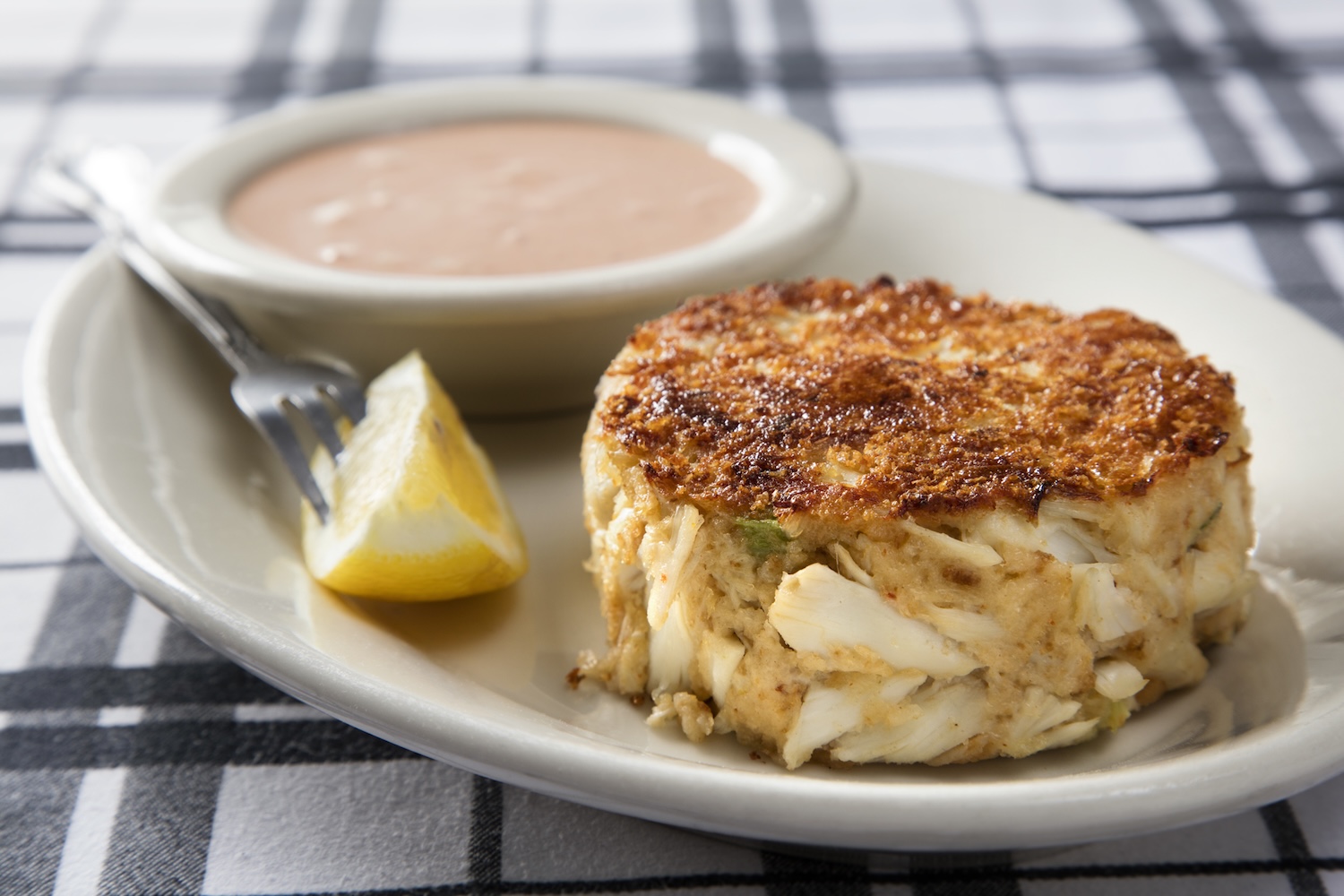 Our signature jumbo lump crab cake is a true Chicago classic, prepared with fresh, premium seafood a 
