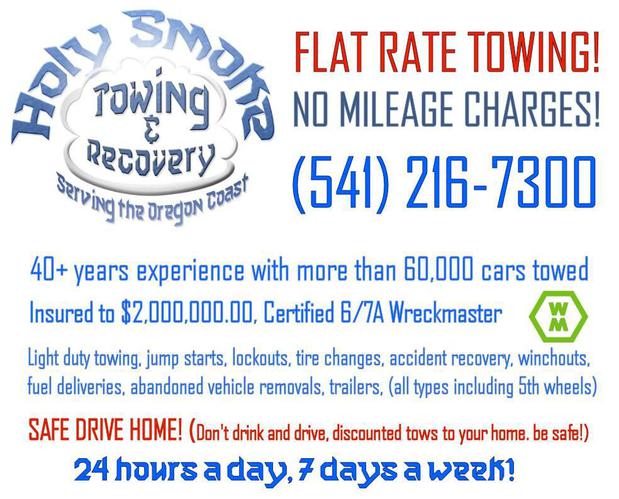 Images Holy Smoke Towing & Recovery LLC