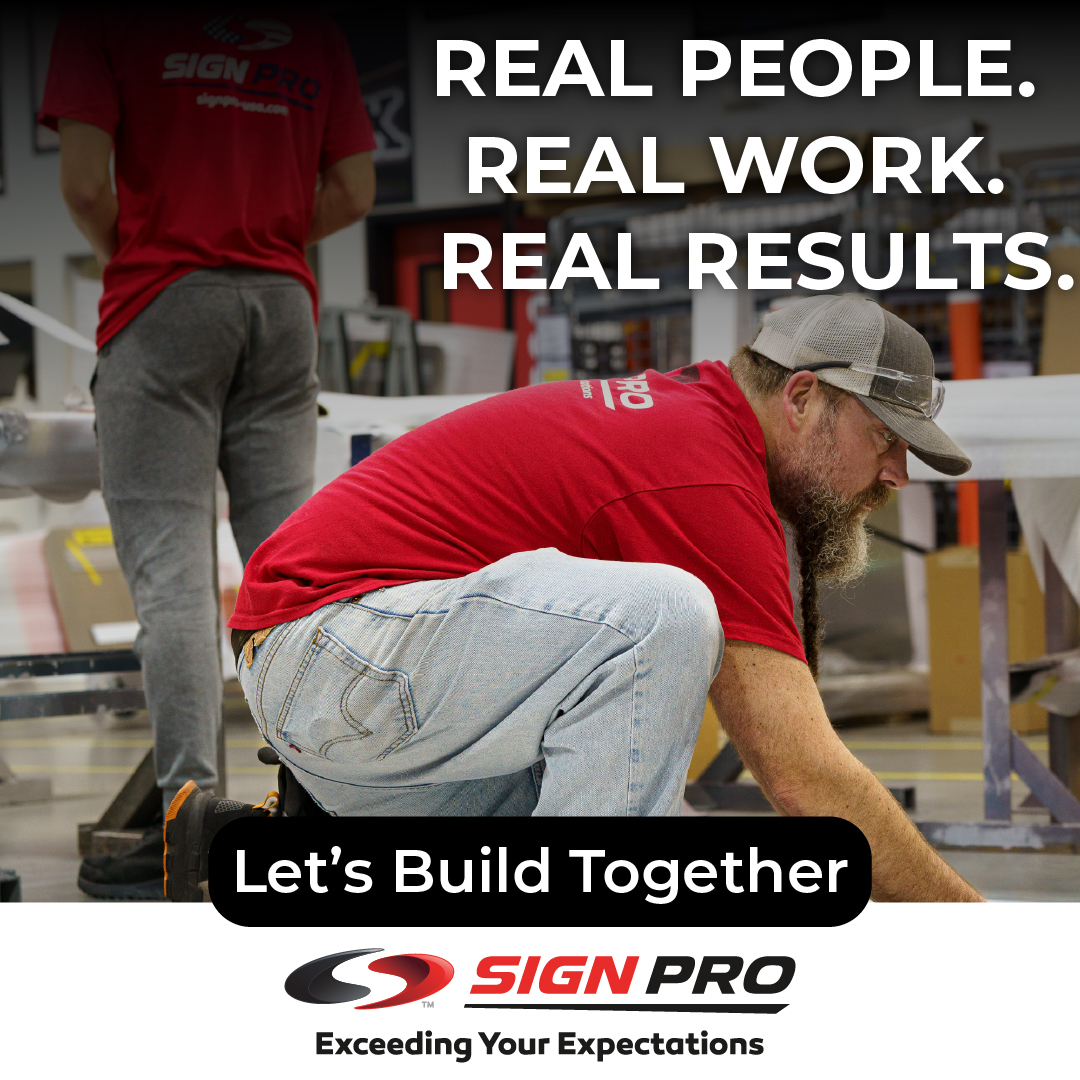 Sign Pro, Inc. highlights its hardworking team and core values with the message “Real People. Real Work. Real Results.” This branded photo showcases the craftsmanship and pride that go into every custom signage project.
