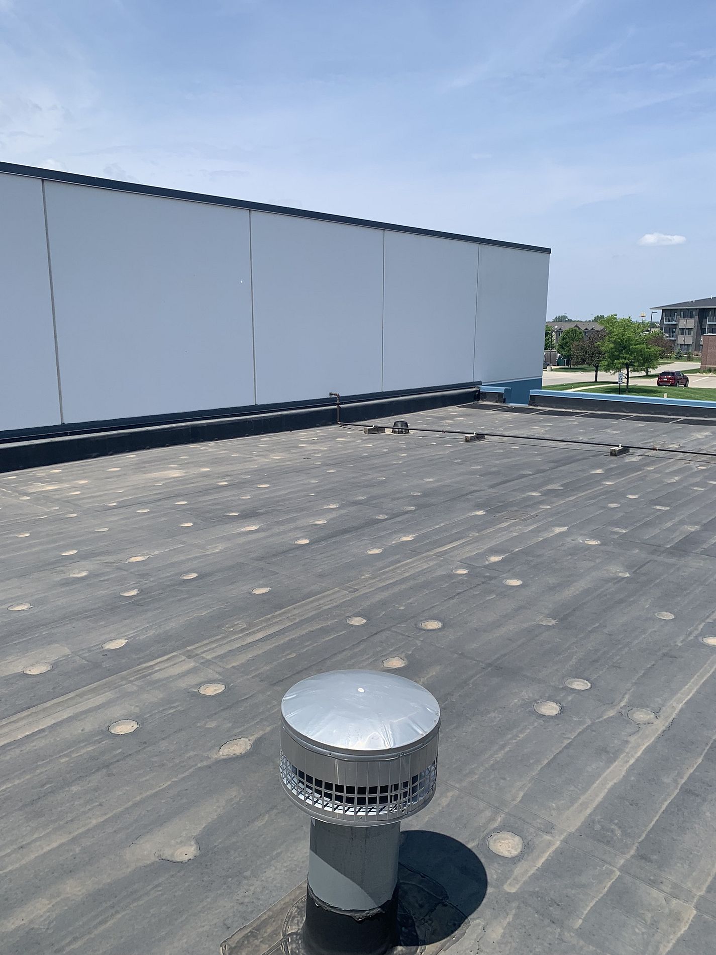 commercial roof inspection in Grimes, IA