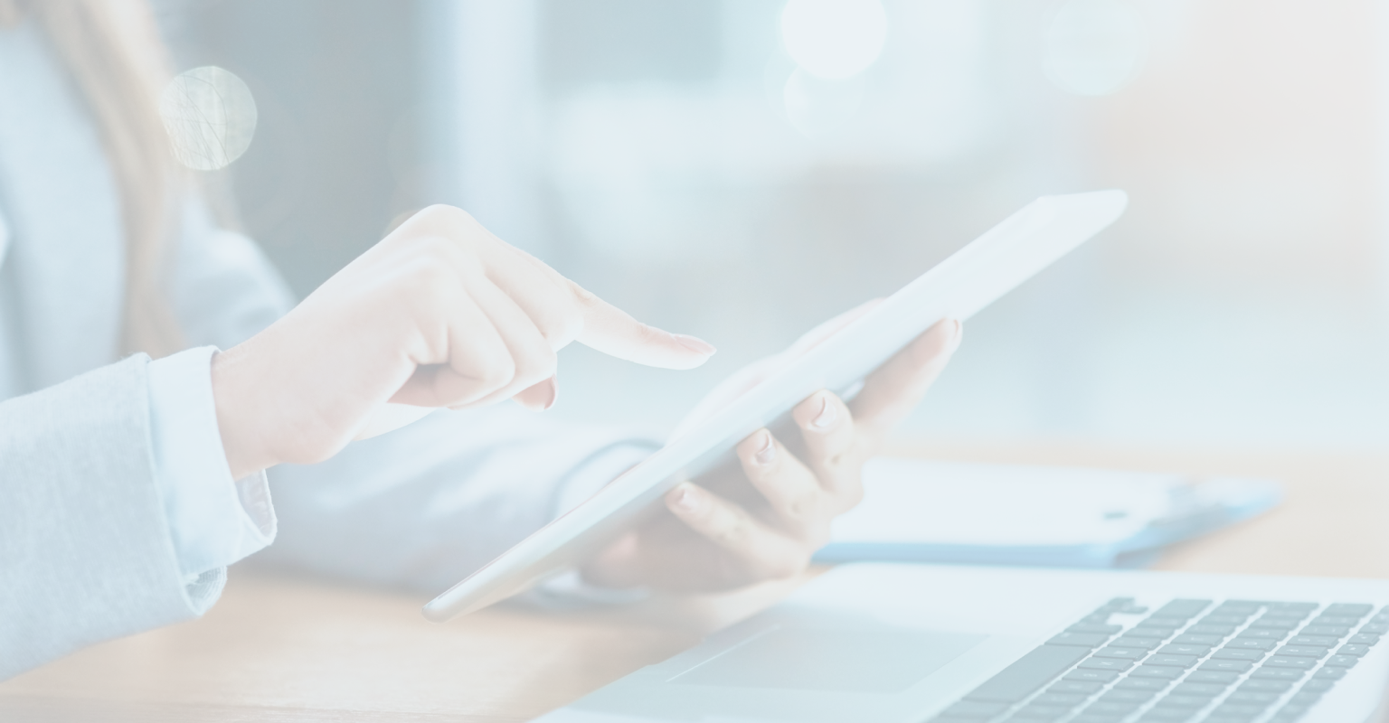 A professional on their tablet.