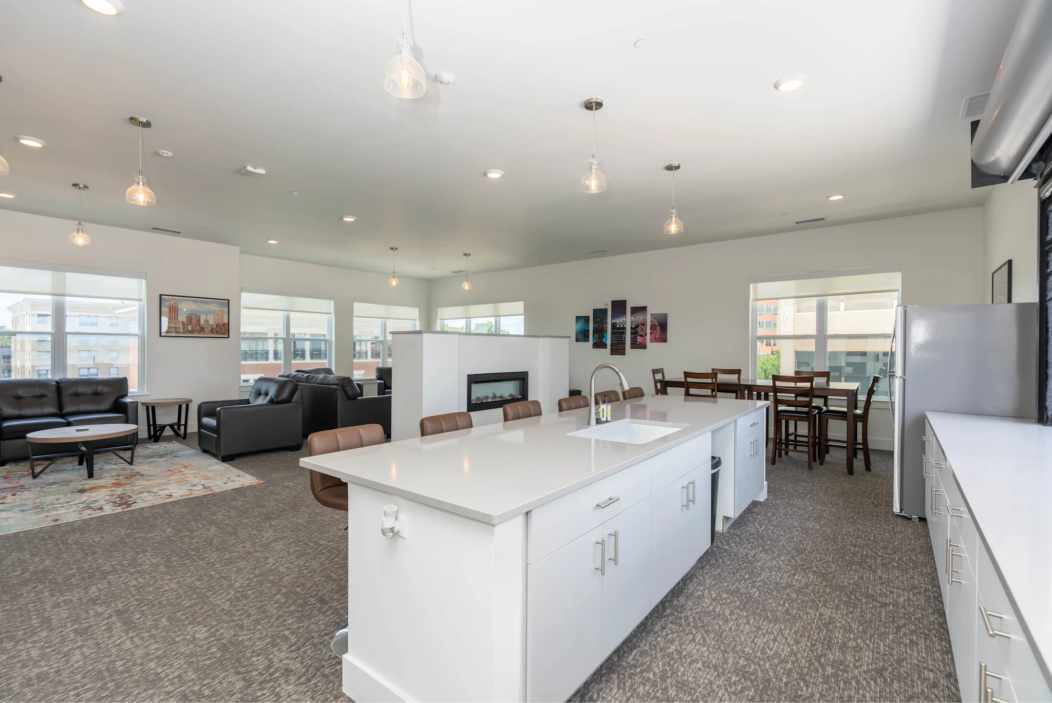 spacious kitchen and living room at Lansing City View Apartments 