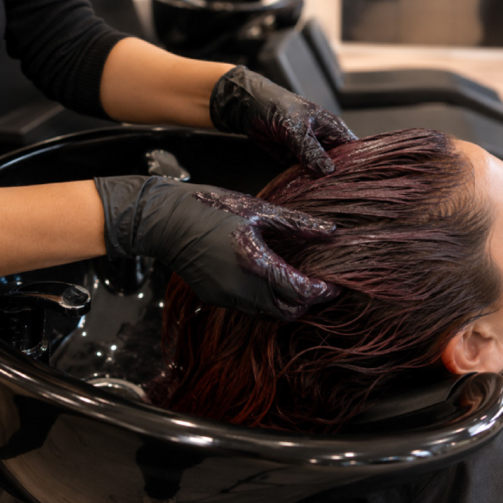 Professional toner and gloss application at Avissa Salon in Ann Arbor to refine hair color, enhance  