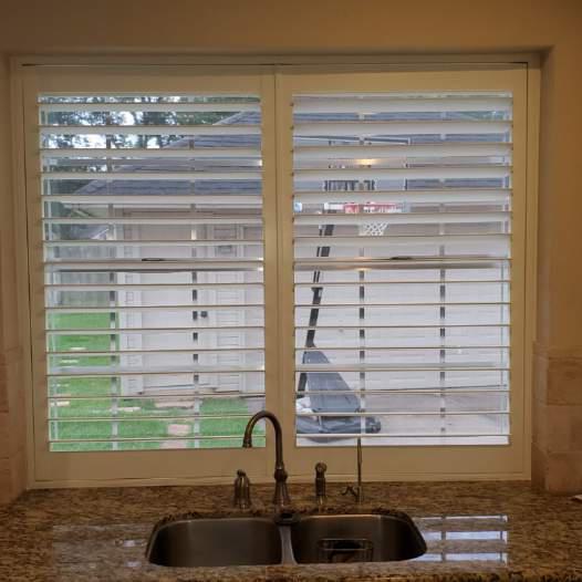 Kitchen windows like this one in Katy, Texas can be covered in a variety of ways. If you’re looking for something classic, how about Our Composite Shutters! #BudgetBlindsKatySugarLand #KatyTX #CompositeShutters #MoistureResistantShutters #FreeConsultation #WindowWednesday