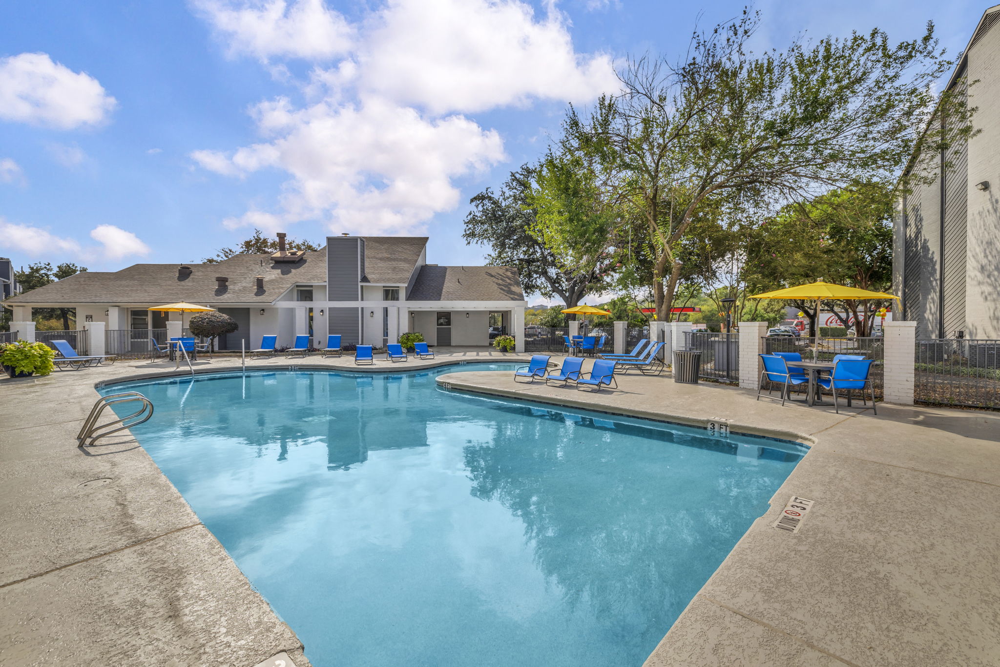 Swimming pool with relaxing chairs 