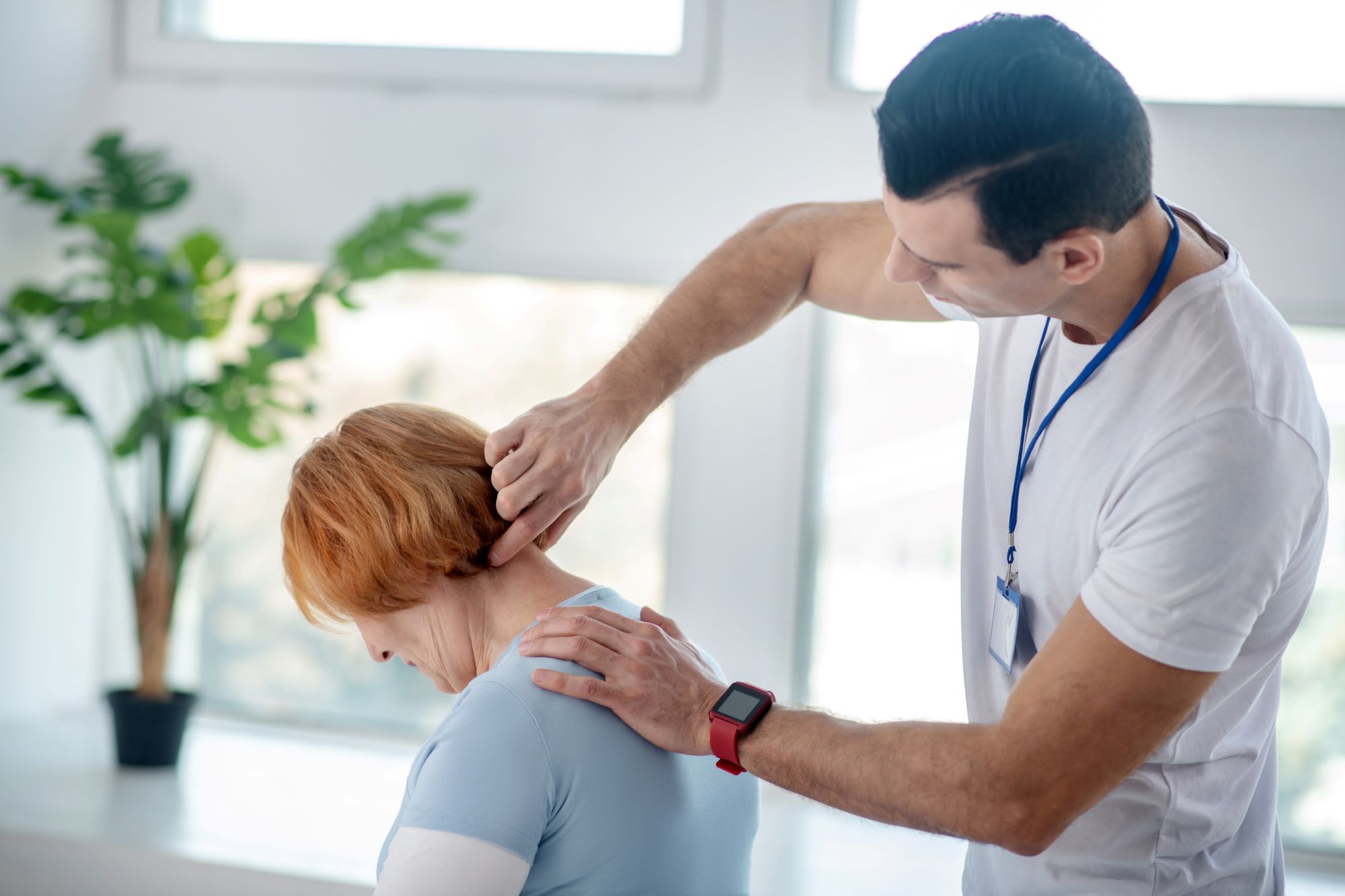 chiropractor working with a patient