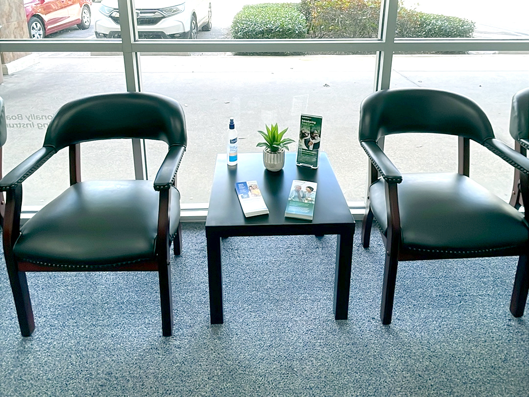 Interior photo of the seating area for AudioNova hearing clinic in Port St. Lucie, FL