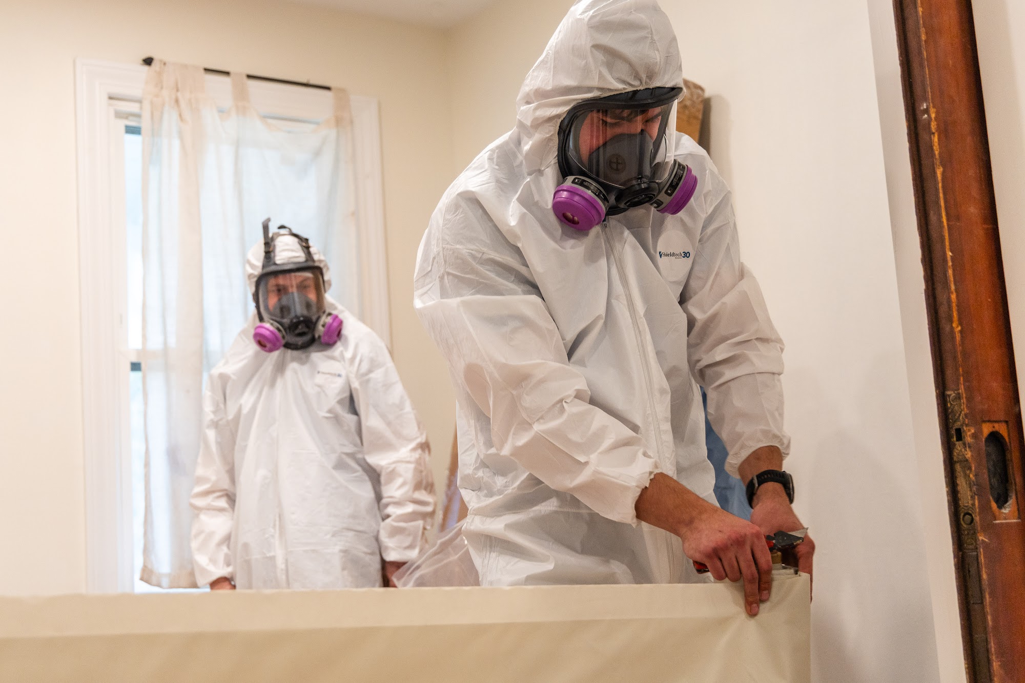 Containment barriers protect the surrounding home while CT Mold Remediation Specialists completes mo 