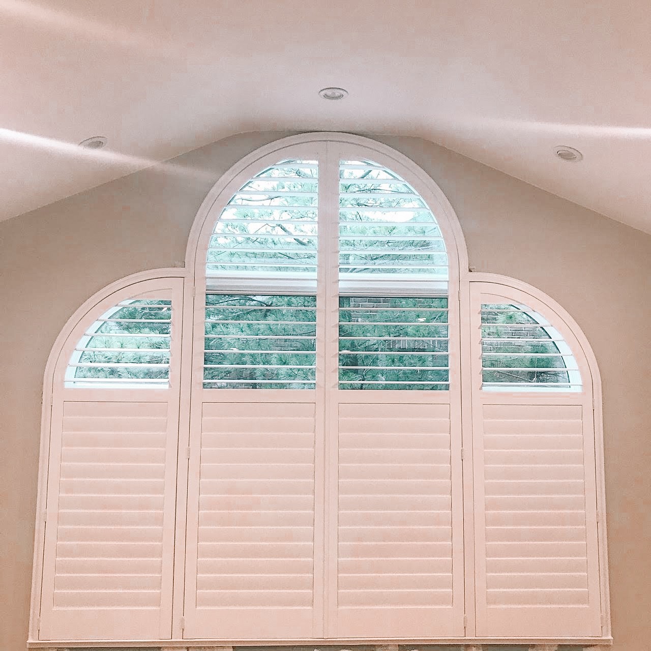 Unique shaped windows? No problem! We have beautiful treatments for any window! These plantation shutters were the perfect fit for this window in Manalapan, NJ