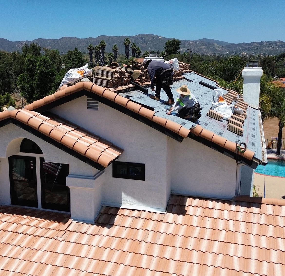 Tag Roofing team replacing tile roof Temecula