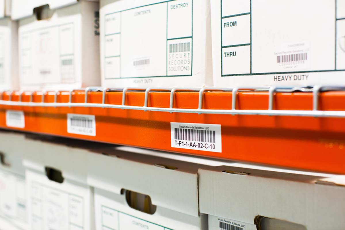 SRS records storage boxes on shelves