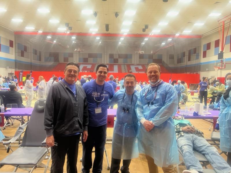 These photos highlight a recent event with company activities. We have a heartwarming group shot taken in the school gym, capturing Dr. Jake Williams alongside his colleagues volunteering at the Texas Mission of Mercy event, where they provided free dental services to those in need.