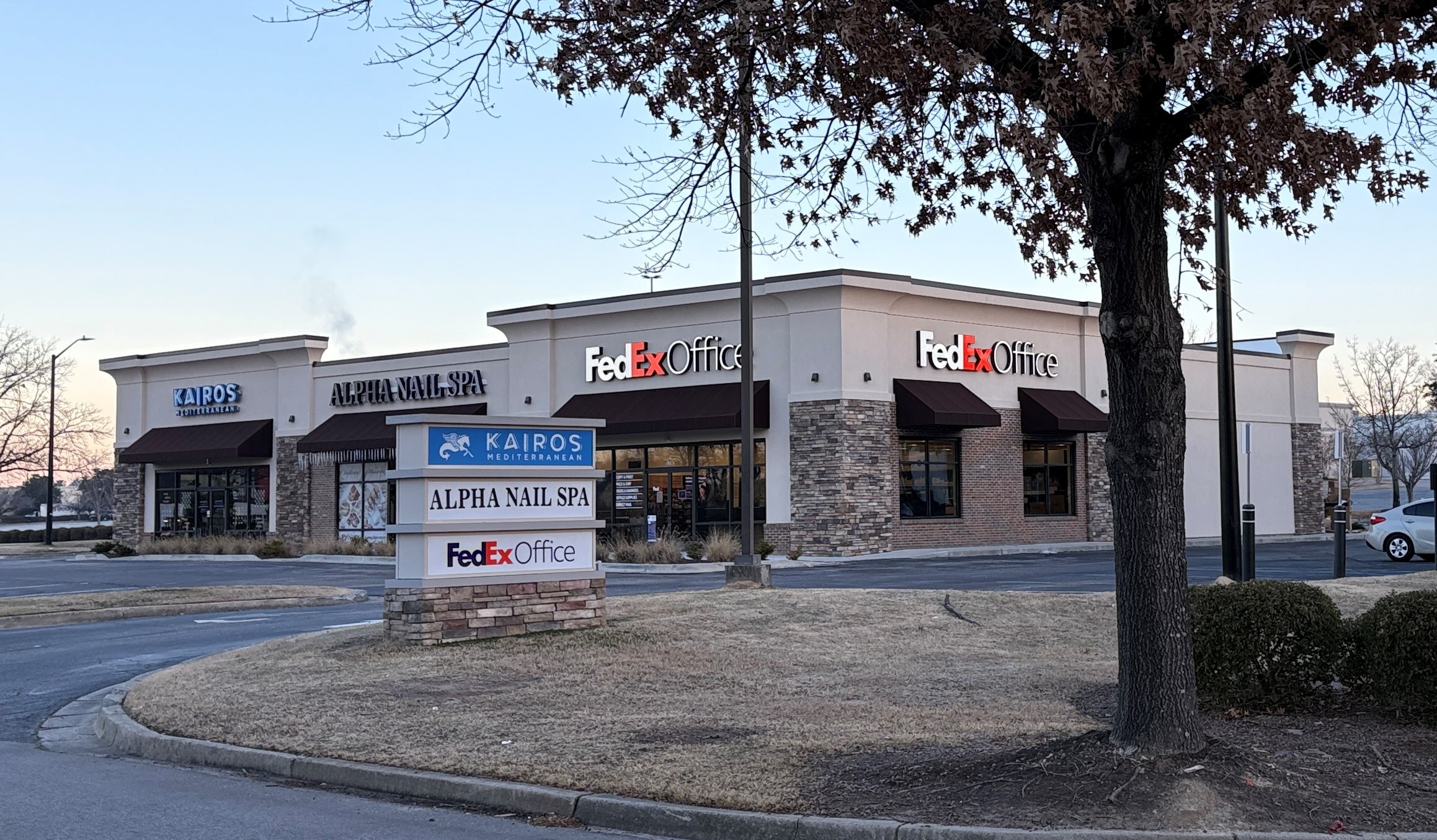Find Us at Columbiana Circle: View of our pylon sign and shopping center location in Columbia, SC. We are conveniently located next to Alpha Nail Spa and Kairos Mediterranean.