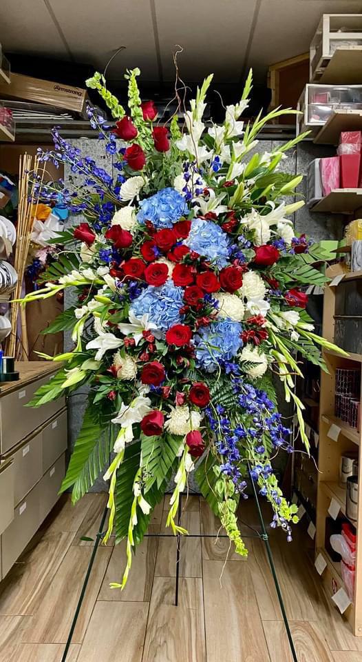 Standing Spray of Red, White and Blue Flowers
