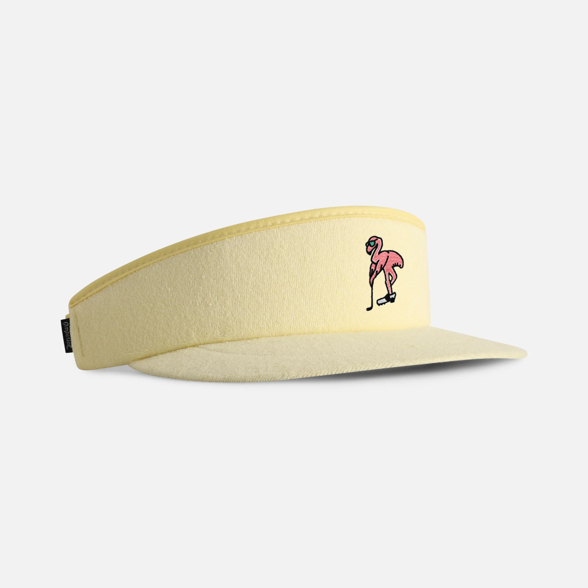 Terry cloth Tour Visor&reg; in pale yellow with a sunglasses-wearing flamingo design.